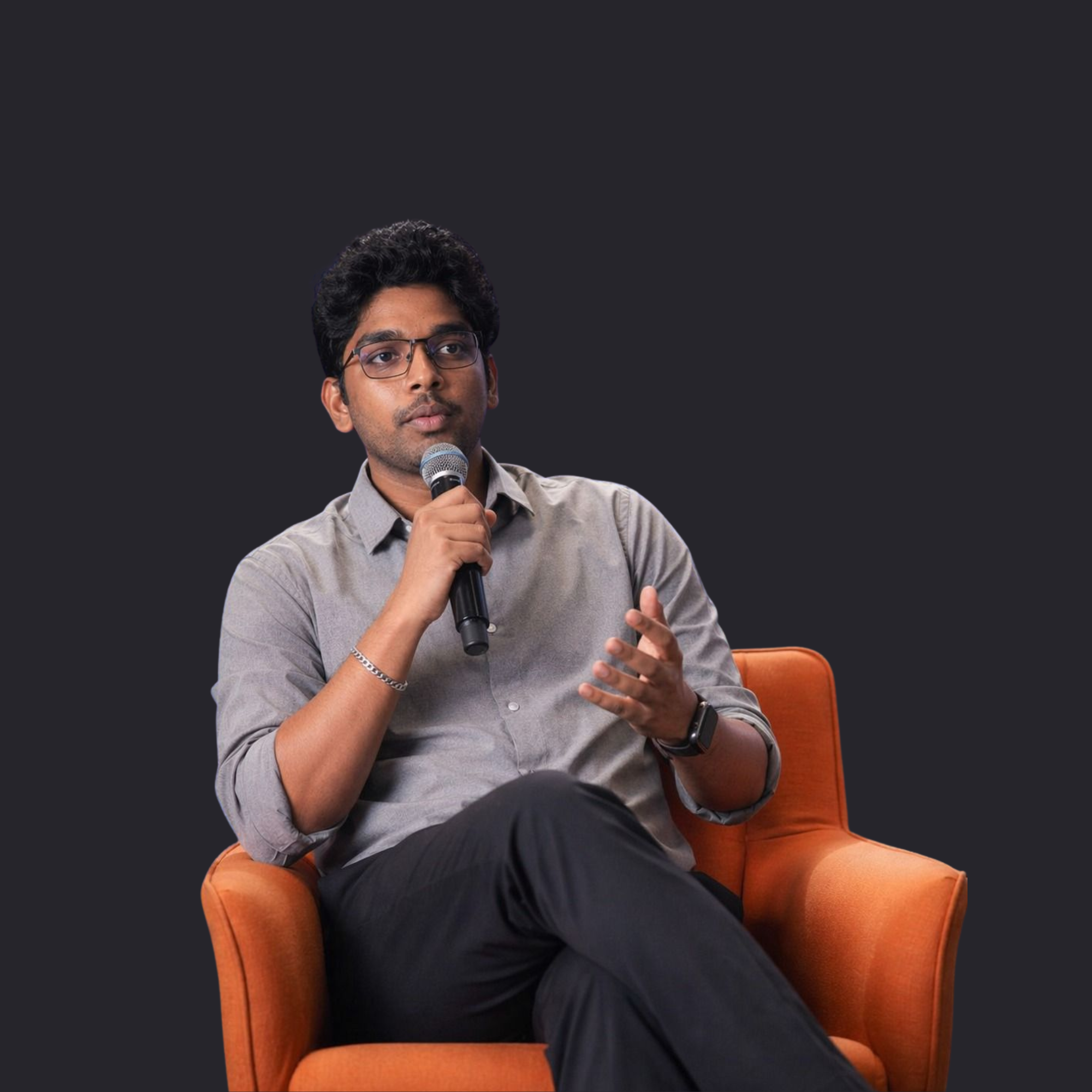 Pavan Kella, founder of Project Kella, seated with a microphone